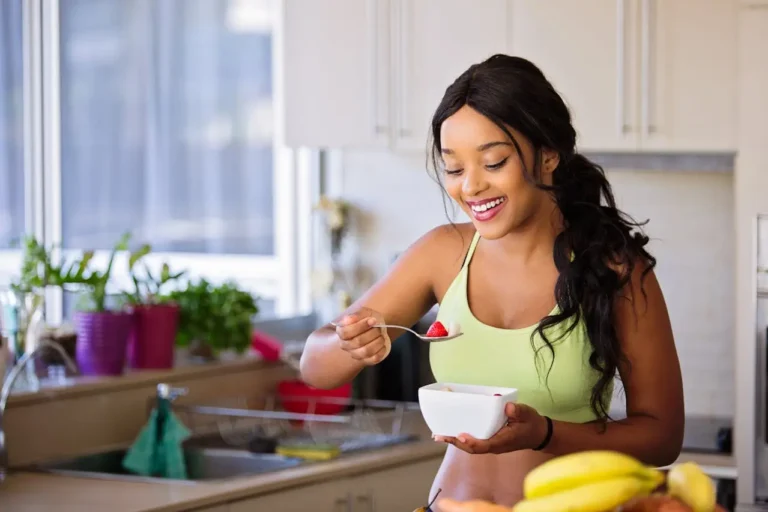 women eating a fruit bowl